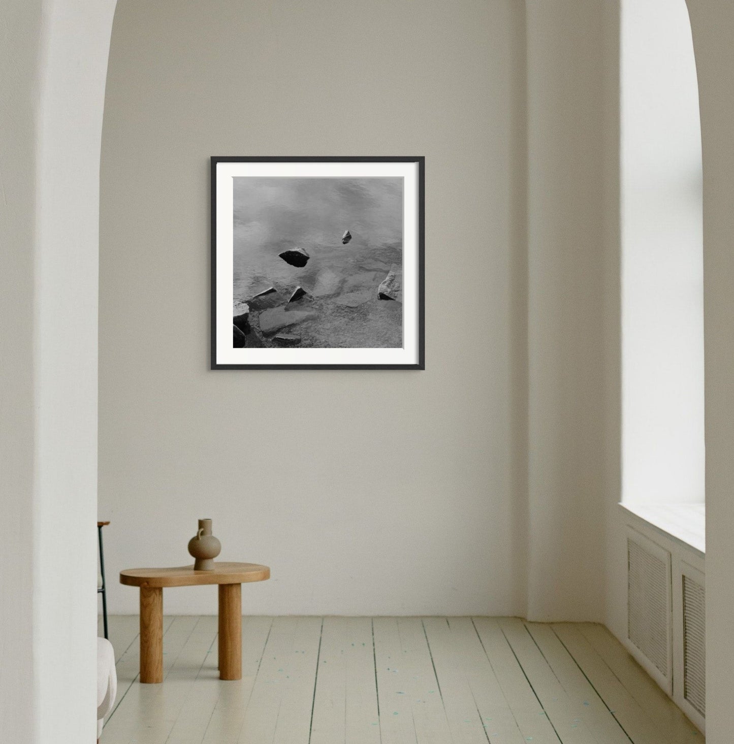 Black and white analog fine art photography print featuring a landscape with a lake and rocks in Norway, wall art with framing options.