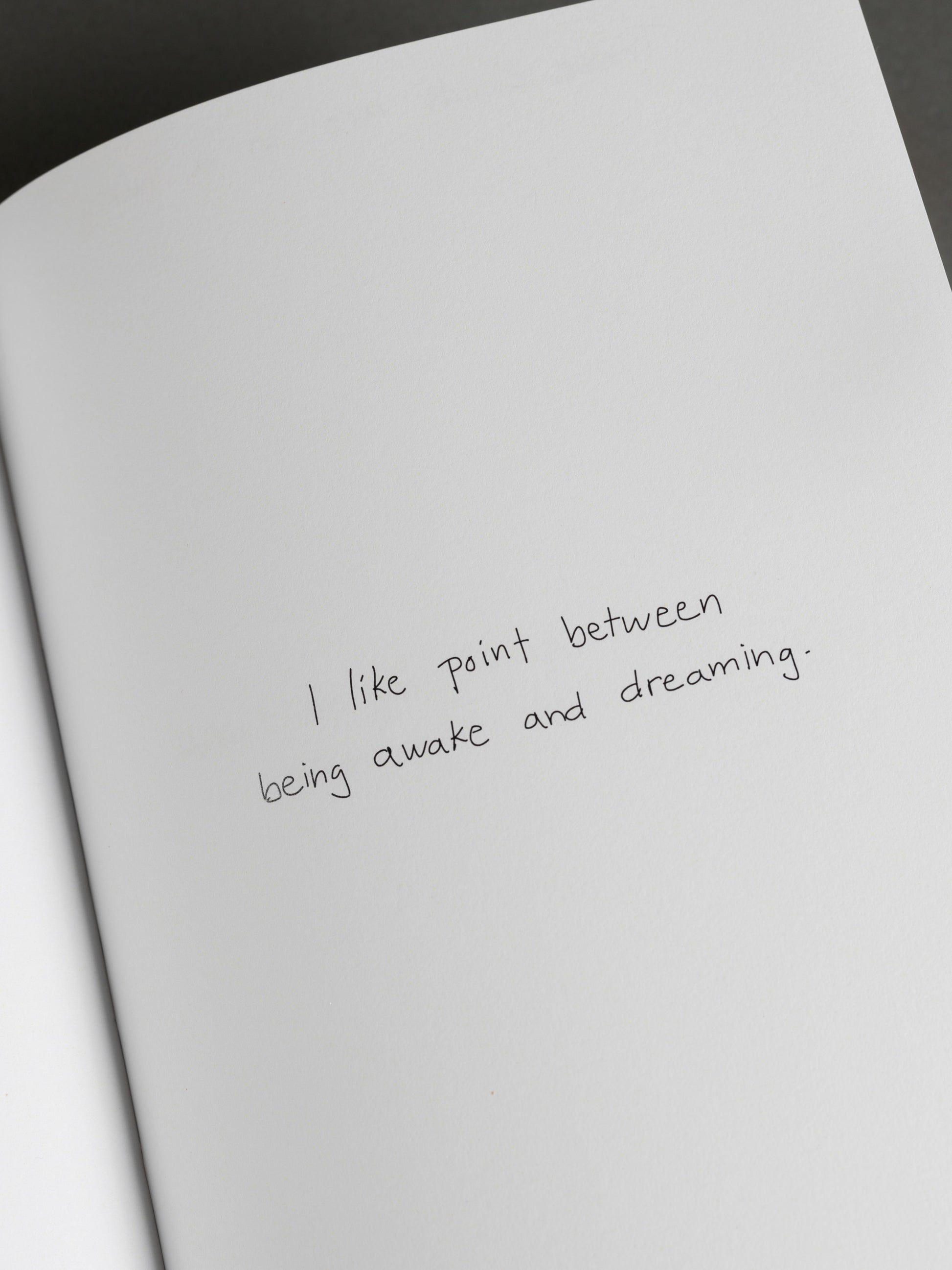 Artist's book titled 'It's a Small Day,' features photography of everyday moments. Everyday thoughts.