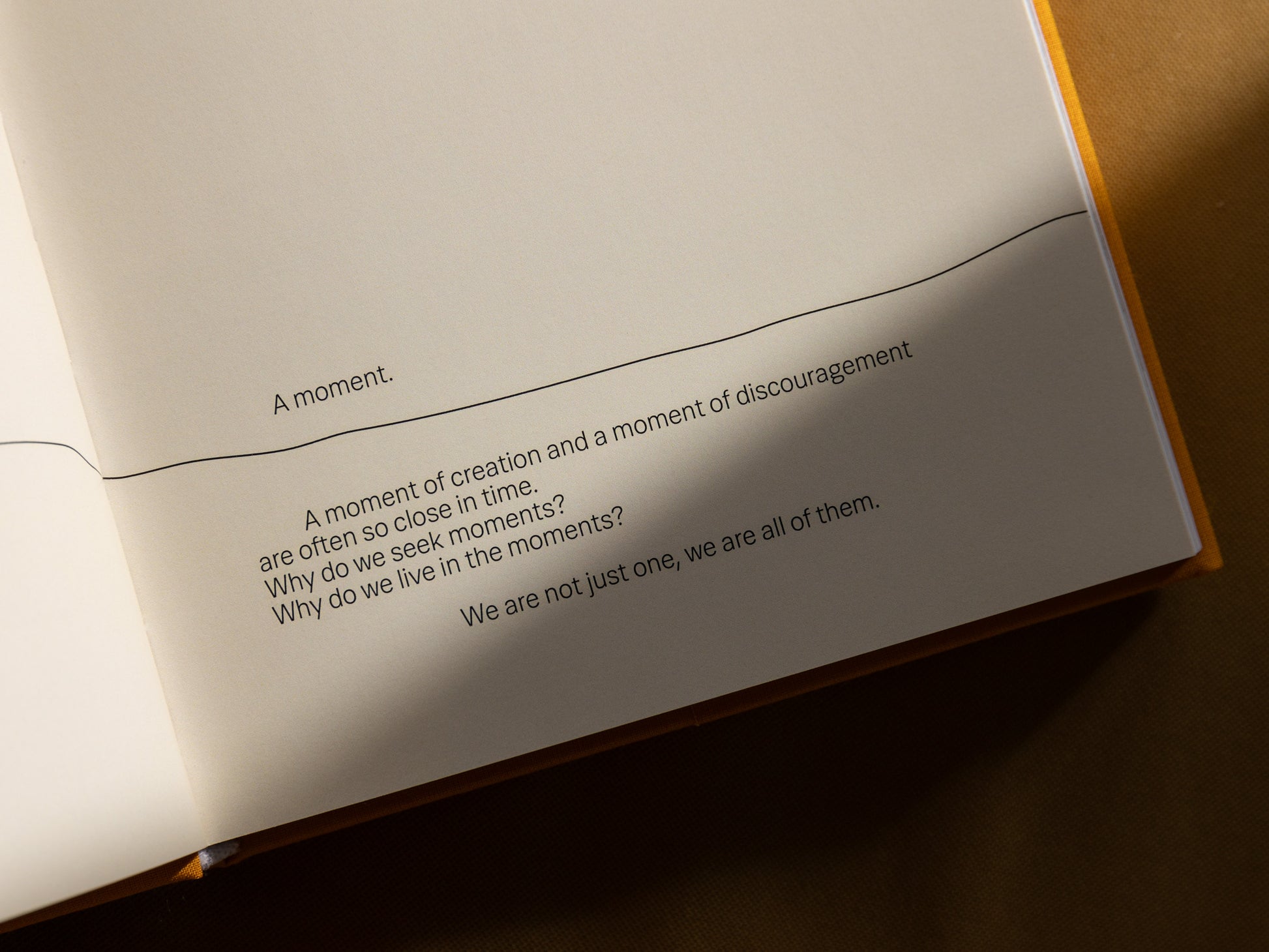 Artist's book titled 'It's a Small Day,' featuring 300 pages of photography and text, text detail