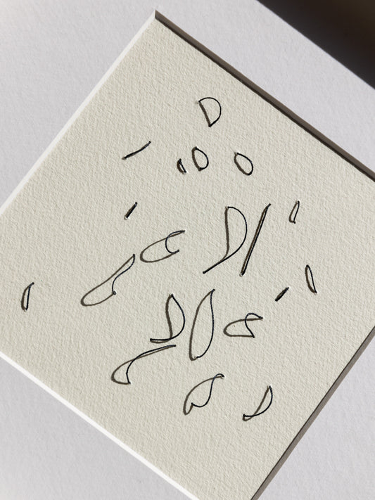 Framed abstract embroidery on paper, an original minimalist relief artwork representing black birds, changing with the light, detail