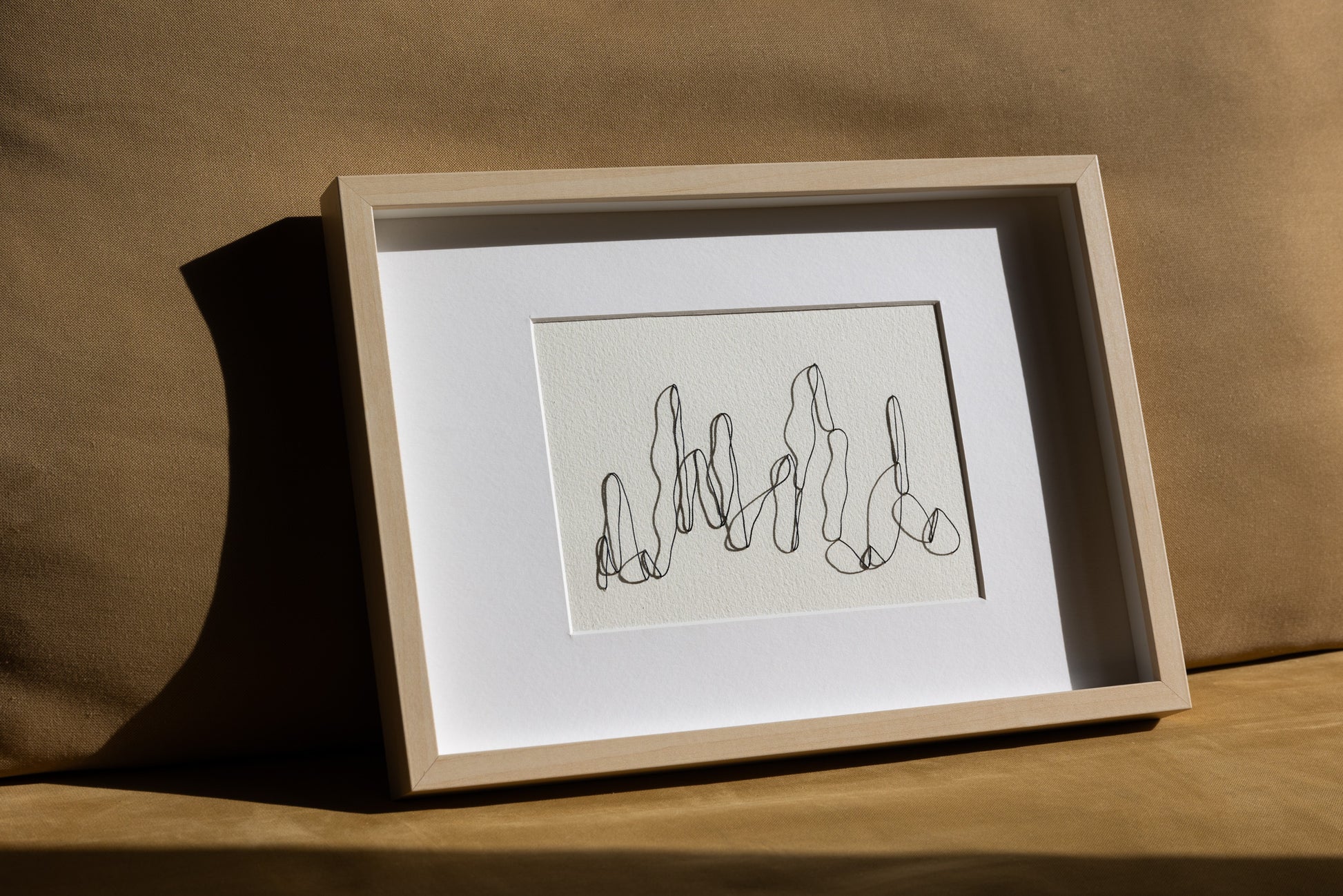 Framed abstract and minimalistic embroidery on paper, an original minimalist artwork that changes with the light, dynamic