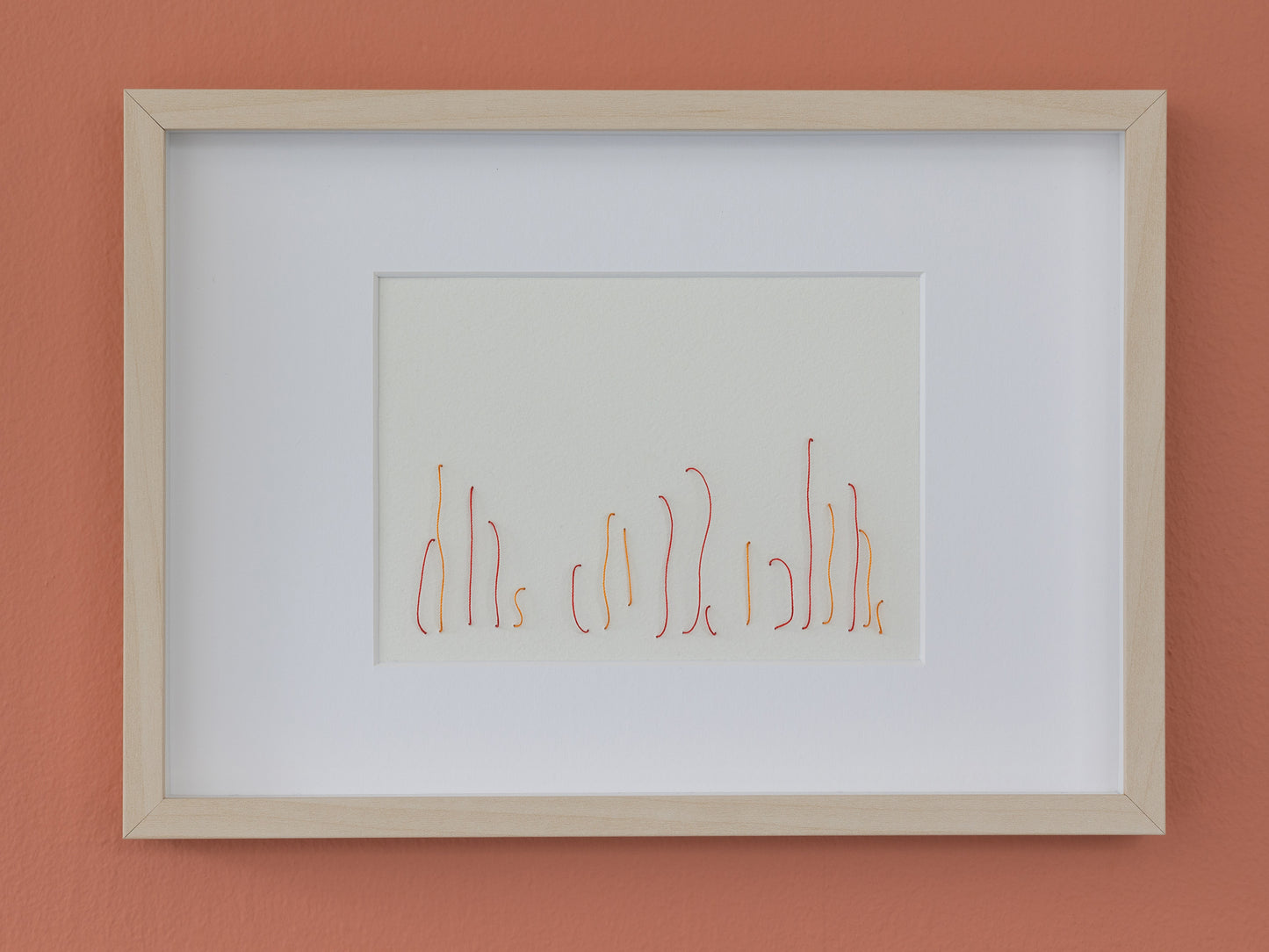 Framed embroidery on paper, an original minimalist artwork that changes with the light, represents garden
