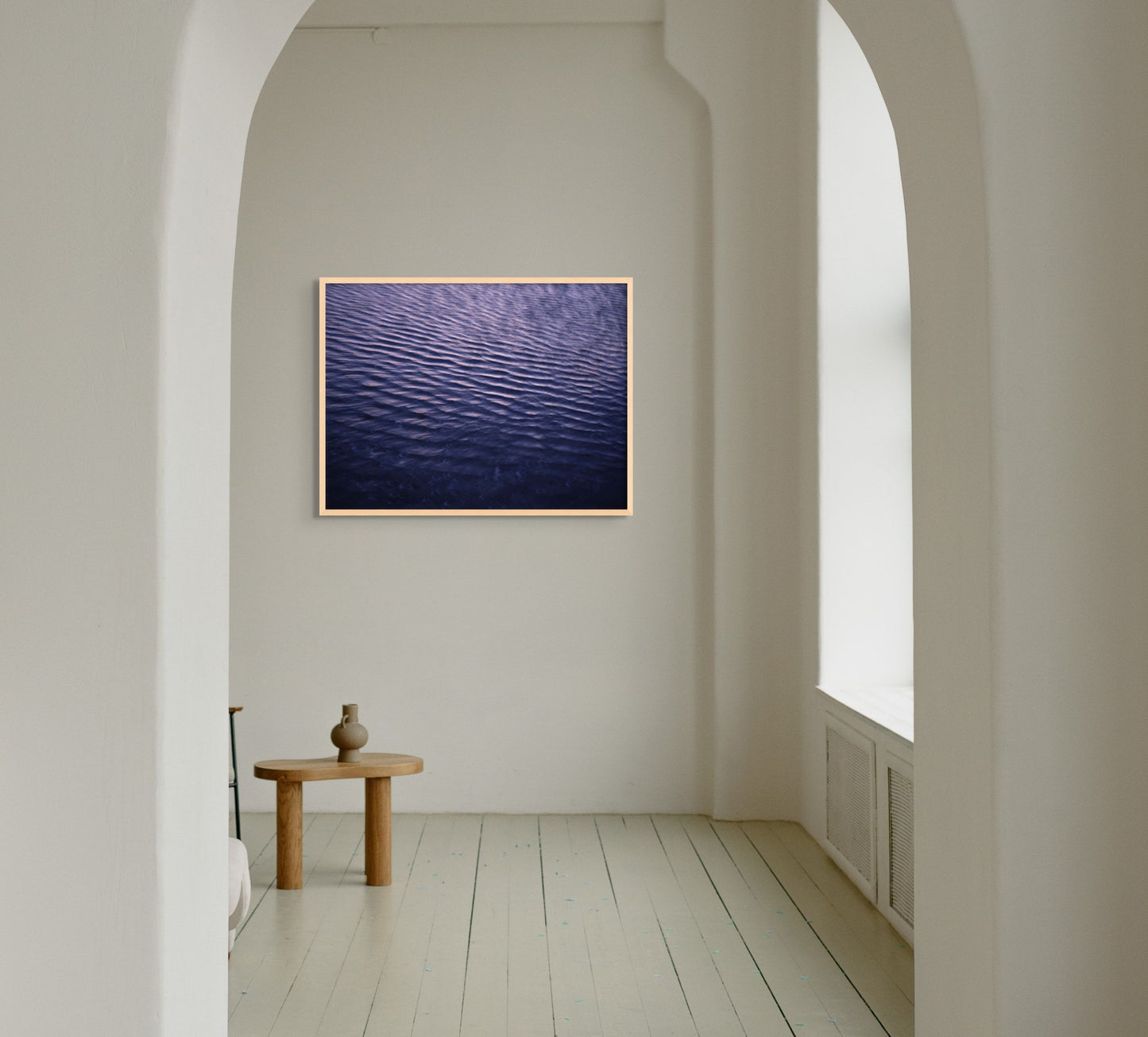 Fine art photography print featuring the purple-colored sea, shown in an interior setting, available in different sizes.