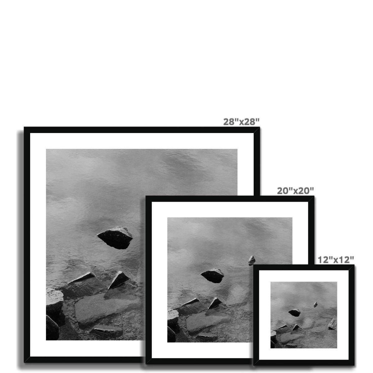 Black and white analog fine art photography print featuring a landscape with a lake and rocks in Norway, available as wall art with framing options.