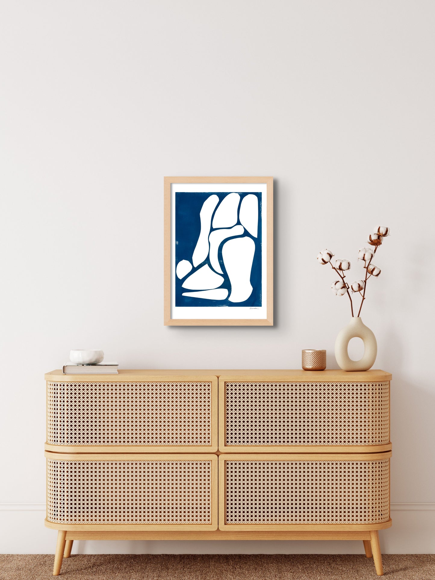 Art print featuring abstract white and blue shapes, displayed in an interior setting, available as a Giclée print with framing options.