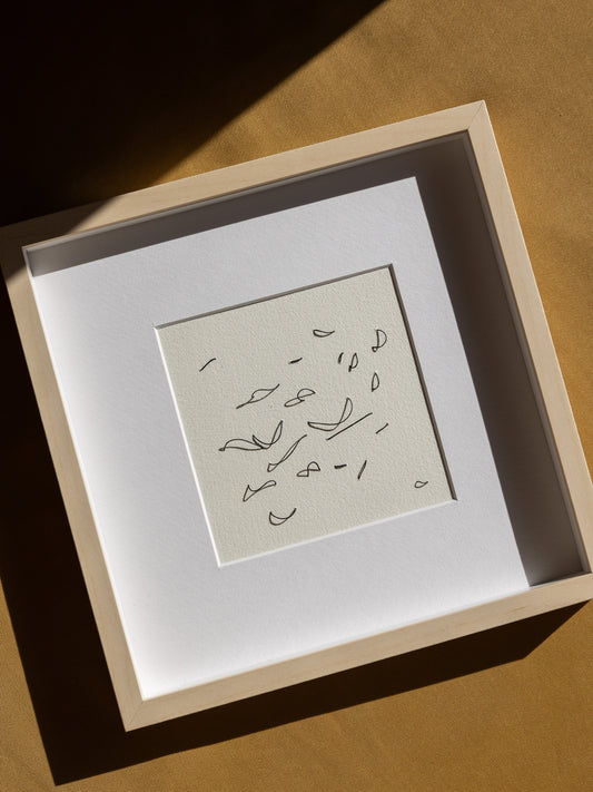 Framed abstract embroidery on paper, an original minimalist relief artwork representing black birds, changing with the light.