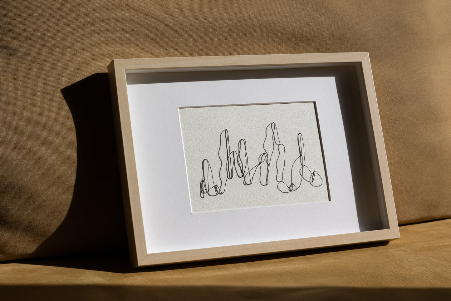 Framed abstract and minimalistic embroidery on paper, an original minimalist artwork that changes with the light, dynamic 