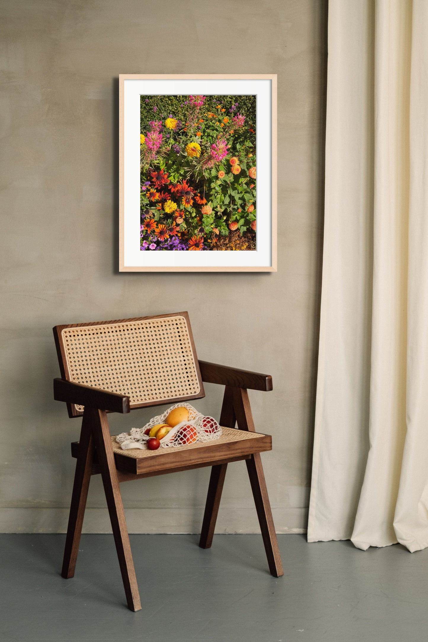 Colorful fine art photography print in the interior, featuring a vibrant display of flowers, available as wall art with framing options.