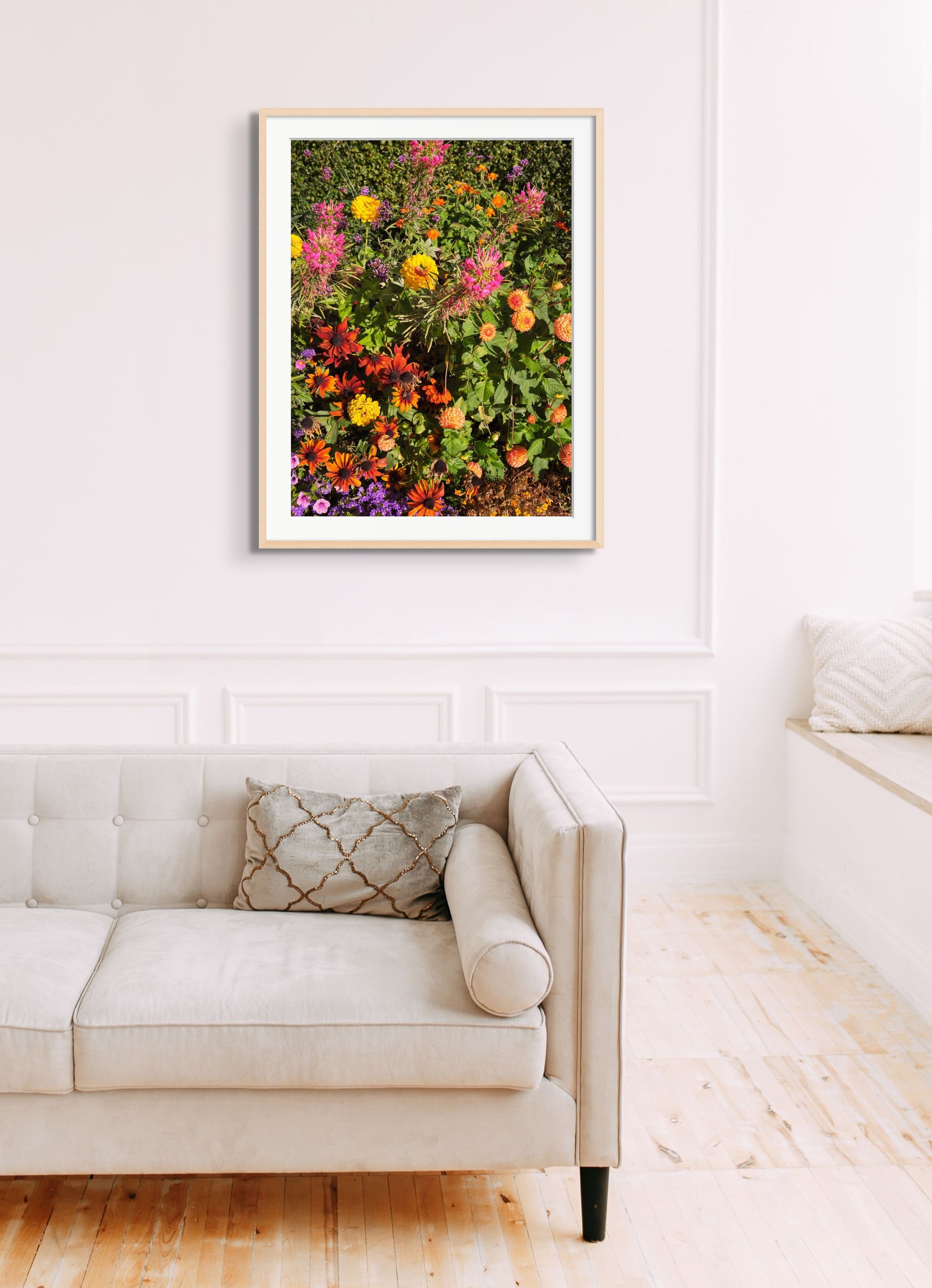 Colorful fine art photography print featuring a vibrant display of flowers, shown in an interior setting, available as wall art with framing options.