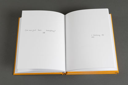 Artist's book titled 'It's a Small Day,' featuring 300 pages of photography and text in a unique two-in-one format, writing 