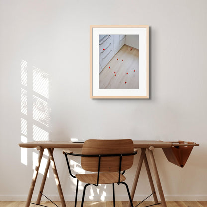 Still-life photography featuring tomatoes on the kitchen floor. Limited edition photography print, wooden frame 